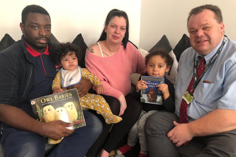 Councillor David Mellen with the 5,000th child to receive the free books, baby Remae Gordon-Goode, with dad Raelle, mum Melanie and sister Kyron (Image: Nottingham City Council)