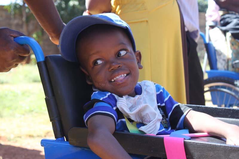 Aka Nyambe from Chilenje in his first ever wheelchair. Transformed his life, and that of his mother.