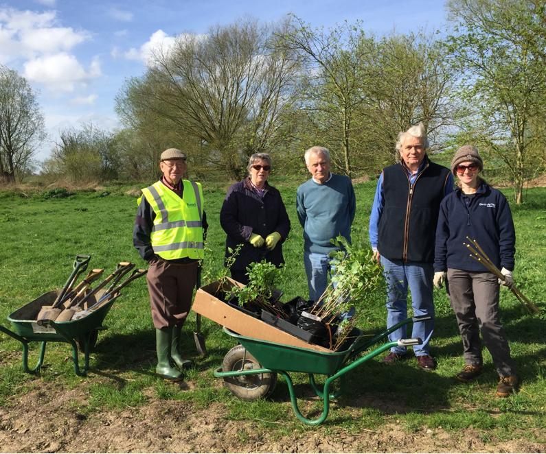Our members planting trees provided by the Woodland Trust at Barnwell Country Park, Oundle