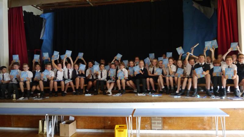 Year 6 pupils from Brookmans Park School receive their copies of Usborne Dictionaries