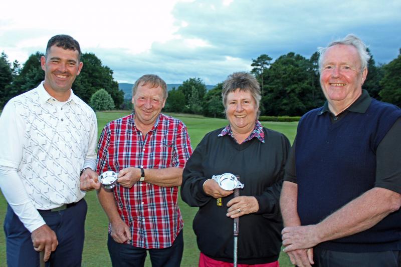 Picture shows Rotary President Gordon Steele (2nd R)  with the winning Blacknest team (L to R) Mark Lockhart, Rosie Brown and Robert Haddow. Missing from this line-up is Blacknest