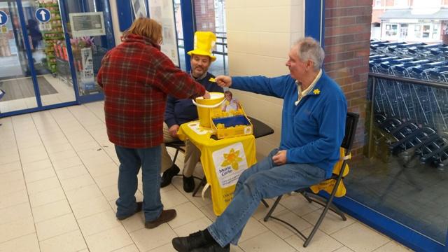 Rotarians Ifor and Nigel with another happy customer supporting Marie Curie