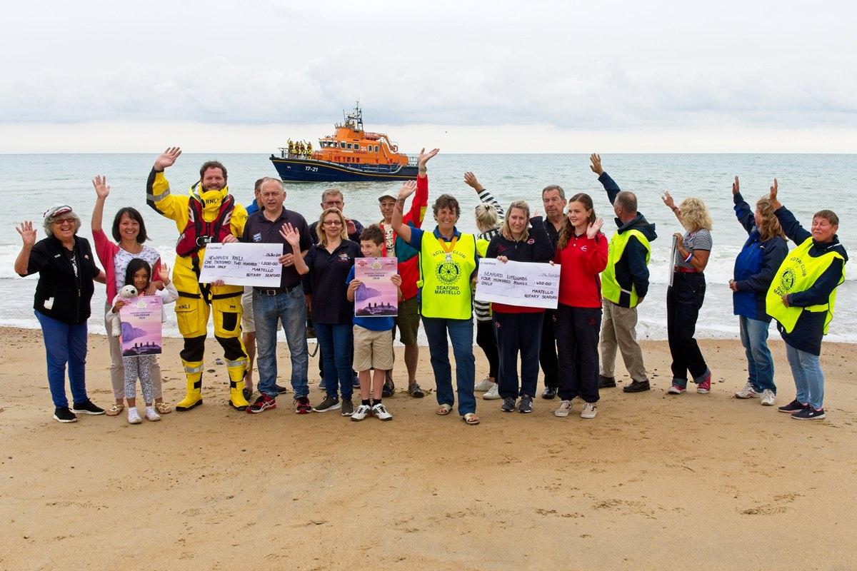 Martello Rotarians on the beach at Seaford with members of Newhaven RNLI and Seaford Lifeguards