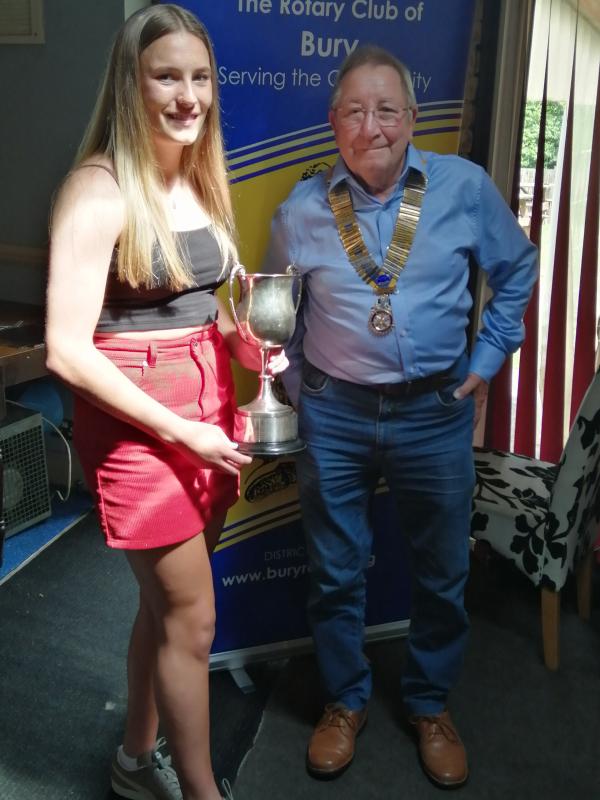 Award Winner – Niamh is pictured being presented with the Wilf Ainscow “Ranger” Trophy by John Cooper, President of Bury Rotary Club