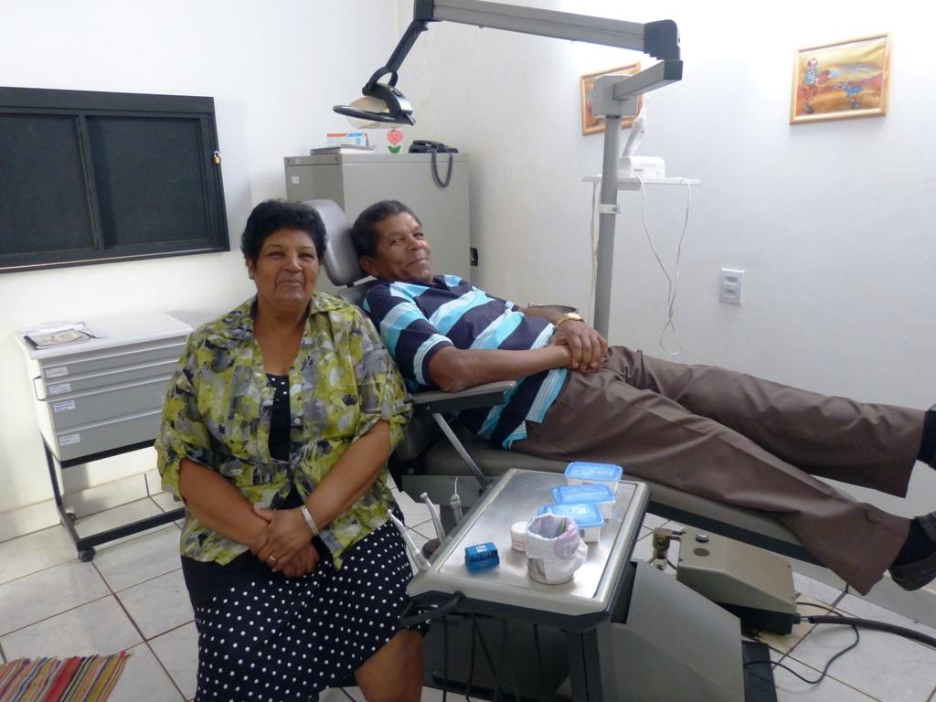 Two Brazilian Rotarians in a simple dental surgery that we are working with them to establish for local people who do not currently have the benefit of facilities for dental treatment