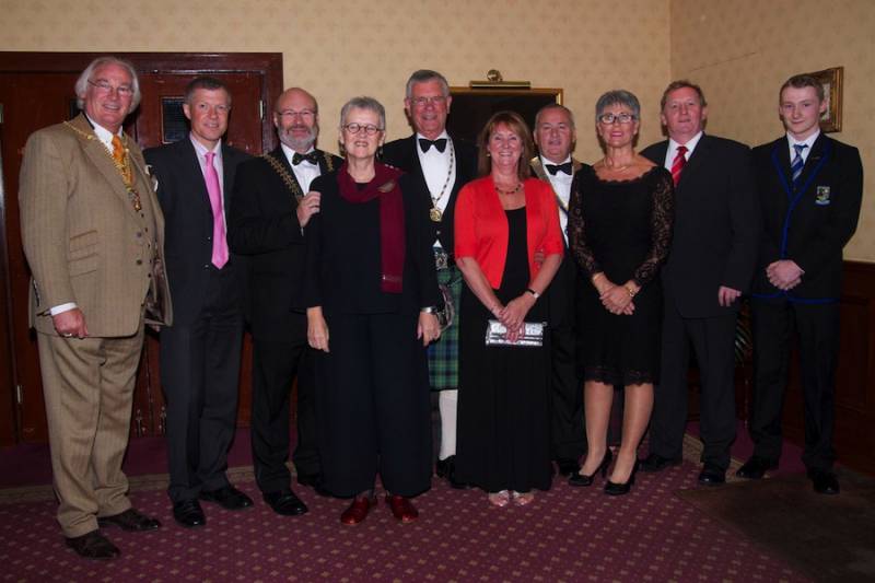 President Tom Taylor with his partner Sian welcome the guest speakers and their partners.