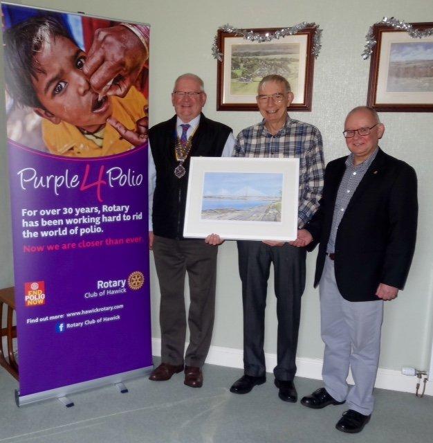 Brian Tait receives his prize of a framed print of the three Forth crossings from Club President Scott Elliot and Foundation Committee Convenor Gus Neilson