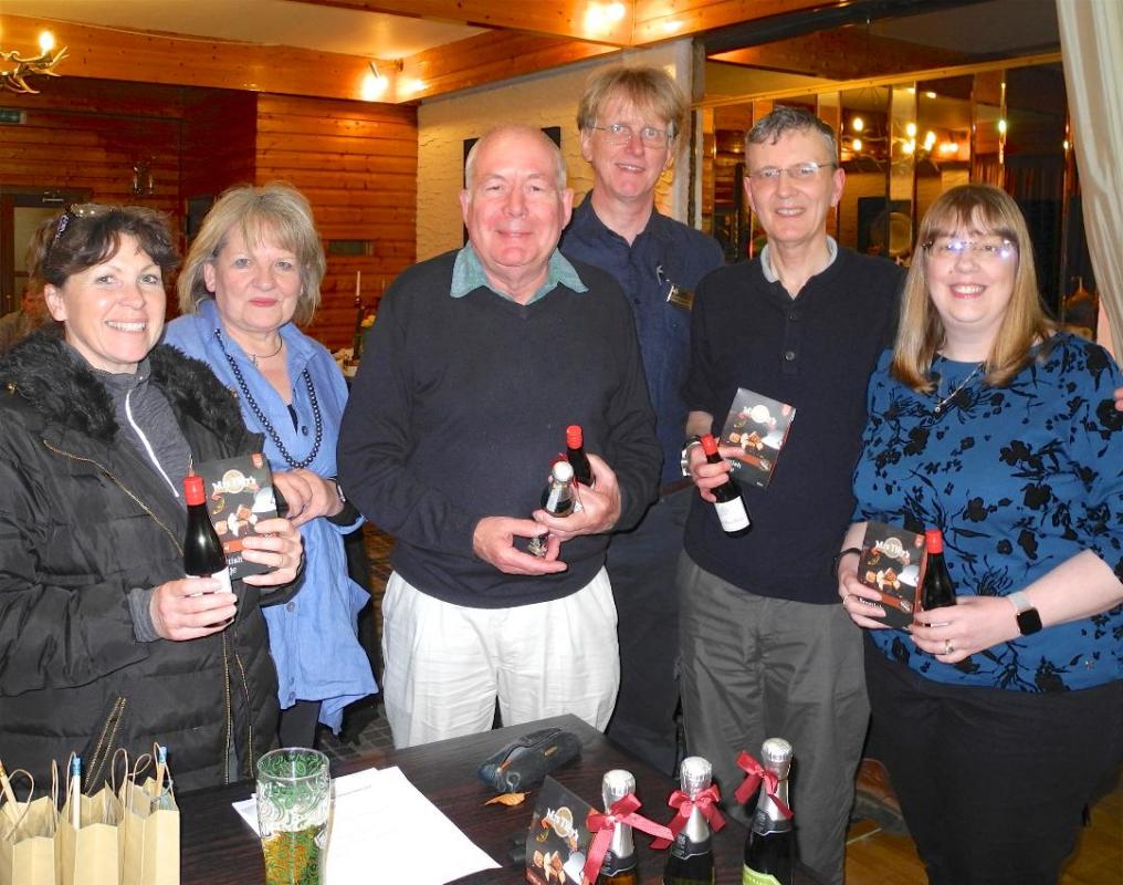Treasure Hunt Winners 2019, David Chisholm, Dawn Green, Russell and Fiona Wheater with Linda and Steve Bassett the organisers in the background