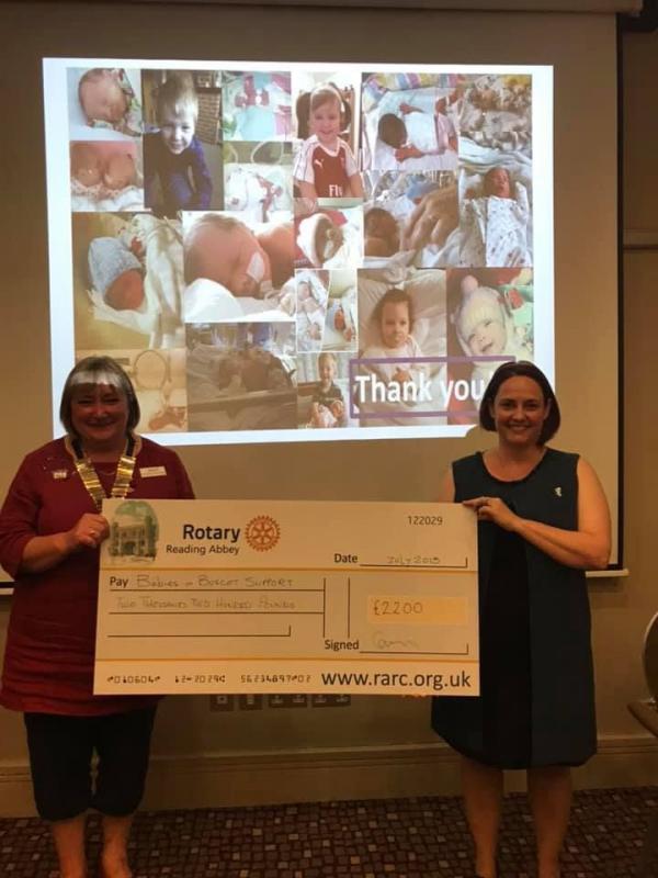  President Frances Woolaway presenting a cheque for £2,200 to Sarah Critchley and the charity Babies in Buscot Support