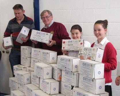 Rotarians with pupils from Falklands Primary School, collecting Shoeboxes