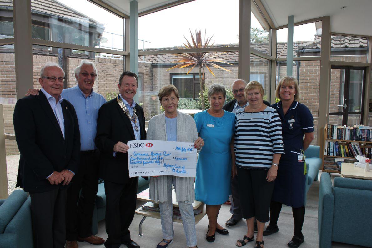 President George presenting cheque for £1500 to Cornwall Hospice Care