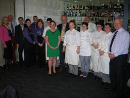 Hospitality students and staff with President Elect Mary Fraser on left, Caroline Hogg and Bob Armstrong in centre and college principal Dr Ken Thomson on the right.