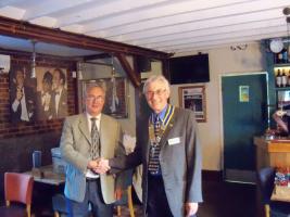 Past President David Swain hands over to President Bob Knowles
