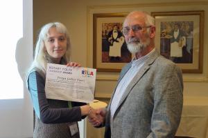 Freya receiving her certificate from Martin Davies from Borderland Rotary Club who organise RYLA.