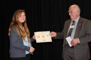 Successful student receives her award.