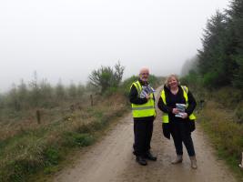 Rotarians Al and Mary on the access road to the spectators' parking area