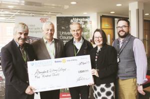Cheque Presentation to Abingdon & Witney College, from left to right:-Rotarians  Richard Smith, Brian Wright and Keith Crawford with College Principal Di Bachelor and Leader Mickey Day
