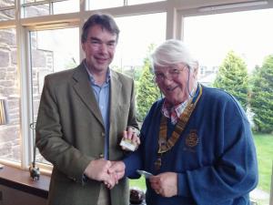 President John Taylor welcomes Angus Barrie as a new member of Crieff Rotary Club following his induction at the Club's weekly meeting.