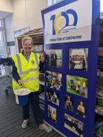 Rotarian Maureen Cosgrave collecting in the foyer of East of England Co op, Stanway