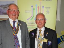 President Scott Elliot welcomes District Governor Lindsay Craig, of the Currie Balerno Club