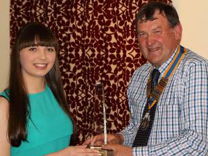 Adrianna Seviour receiving her award from Club President Terry Candy.
