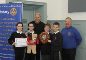 Winning quiz team members from Bridge of Allan Primary School with quizmaster Peter hill and Ivor Butchart (president of Bridge of Allan & Dunblane Rotary Club)