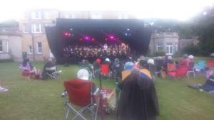 Orchestra and Choir with Soloist on stage