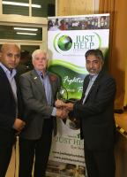Past President Andy receives a life time award from Chairman of Just Help Foundation, Mizan Rahman. 