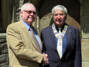 Past President David Gordon hands over to President Mike Griffiths (R) for the year 2015-16