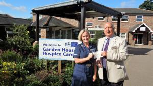 Our picture shows David at Garden House with Jayne Dingemans, Director of Patient Care.