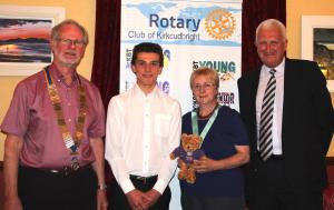DG Olive Geddes MPHF with President Chris, guest Benjamin Garside and Youth Convenor Paul