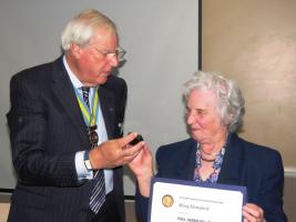 Mary Hansford receiving the Paul Harris Award from Asst DG Gerry Cowan