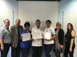 Elwira, Eugenie and Yvonne are nursing students at MK Hospital.  Here they are receiving their bursaries accompanied by the Director of Finance at the hospital.