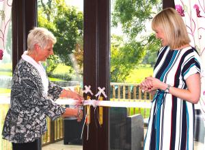 Ribbon cutting Merse House new Decking Area
