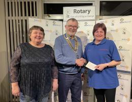 2024 9th March: President Ken presenting a cheque from the TOL Fund to Karen Wright (R) and Mary Tuckett (L) from Linlithgow Day Care Centre 