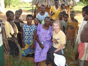 Jenny with villagers in Uganda