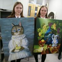 Senior art winners with their paintings