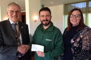President Chris presents a cheque to Jamie Davenport of Macmillan Cancer Support.