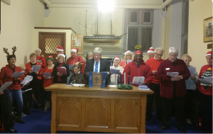Members of Greenock Rotary with friends and family performed a range of  Carols for the residents of the Mariner's Home 