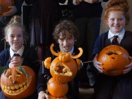 Pupils from Oswestry School, Bellan House show their pumpkins carved for a competition in aid of Care Kenya.