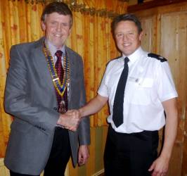 President Elfed welcome Superintendent Gary Ashton of the north Wales Police.