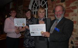 Trina Nunn & Robin Wraight present Jodie Tarbin & Megan Evans with their certificates.