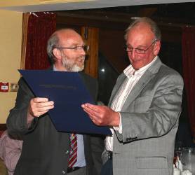 Peter Wimbush receiving his PHF from President John