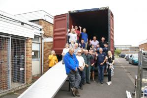 Rotarians, family & friends, Assisted by the Fiji High Commissioner loading container for Fiji