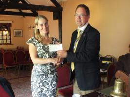 President Chris Whipps Presenting cheque to 'Nelson's Journey' 