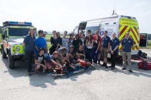 One Thursday afternoon, the campers came to Westhoughton and learned real first-aid techniques with the Bolton Mountain Rescue team.  They did an exercise bringing down injured people from Winter Hill on stretchers.  Here is the whole team