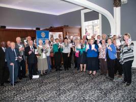 The Rotary Club of Greenock and representatives of the Presbyterian Women's Guild present a cheque and around 1500 pairs of pants to the Smalls for All charity
