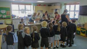 St Lukes School children looking forward to their Porridge.