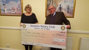 Club President, Steve Knight, presents a cheque for £4,000 to Anne Taylor