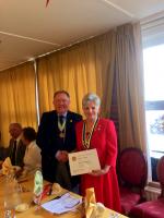 President Sylvia receiving her PHF Award from AG Rtn William WSills
